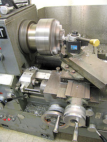 Turning of an aluminium bottle opener on a universal lathe