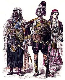 Traditional costumes: a Maronite from Lebanon (left) next to an inhabitant of the Jebel and a Christian woman from Lebanon from the late 19th century (illustration from Zur Geschichte der Kostüme by Braun &amp; Schneider, 1861-1880 Munich)