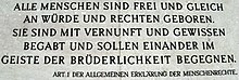 Universal Declaration of Human Rights, Article 1, on the outside wall of the Austrian Parliament building in Vienna.