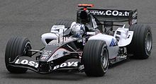 Patrick Friesacher na dirki v Silverstonu z dirkalnikom Minardi PS05, zadnjim izdelanim šasijo Minardi.