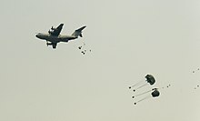Parachute drop of air cargo from a French A400M during exercise Mobility Guardian 2017.