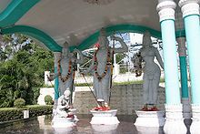 Rama with Sita and Lakshmana, in front his devoted servant Hanuman