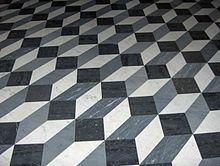 Gresie în Bazilica Sfântul Ioan Lateran din Roma. Modelul creează o iluzie de cutii tridimensionale.