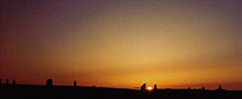 Midsummer Sunset on Brodgar_Peninsula (16. June 2003 around 22:30 h) - The position of the sun at sunset exactly between two prominent stones is a purely graphical/aesthetic moment and must not be misunderstood as an interpretation of possible alignments for the explanation of Brodgar as a solar (or also lunar or otherwise -observatory) in the sense of A. Thom et al.