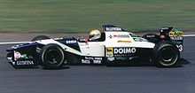 Pierluigi Martini ajamassa Minardilla Britannian Grand Prix -kisassa 1995.  