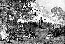 Odawa-høvding Pontiac taler ved et rådsmøde den 27. april 1763, stik fra det 19. århundrede.  