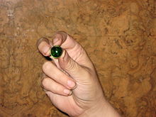 Precision grip (opposed thumb - here against middle and index finger)