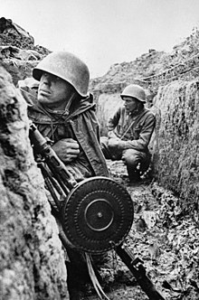 Soviet machine gunners in a trench outside Leningrad, September 1941