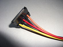 Connector for power supply from PC power supply for SATA drives: Black: Ground (0 V) Orange: 3.3 V Red: 5 V Yellow: 12 V