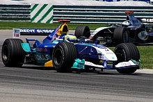 Giancarlo Fisichella při Velké ceně Spojených států v Indianapolis v roce 2004 za tým Sauber.