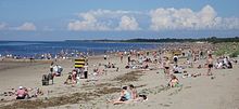 Sommerdag på en strand nær Severodvinsk, på den sydøstlige kyst af havet