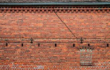 Exposed brickwork with decorative elements