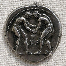 Lottatori su una moneta del 400 a.C. circa