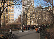 Strawberry Field, the Dakota building in the background.