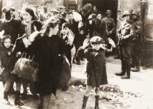 Warsaw Ghetto Uprising 1943. The photograph of the boy, taken from the Stroop report, is one of the most famous photographs of the Holocaust.