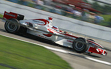 Takuma Sato pilotând pentru Super Aguri la Marele Premiu al Statelor Unite din 2006.