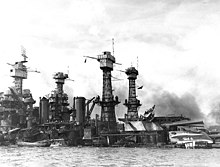 West Virginia (forward) and Tennessee heavily damaged aground