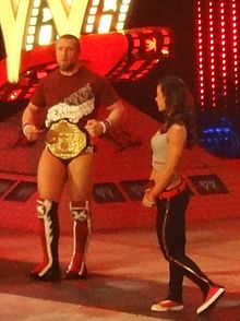 Bryan, da han var verdensmester i sværvægt. Han er sammen med AJ Lee  