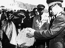 Shah Mohammad Reza Pahlavi at the presentation of land deeds