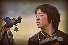 Modern Buryat shaman with ritual staff