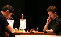 Svidler (Rusland) til venstre, og Adams til højre, Dortmund 2006