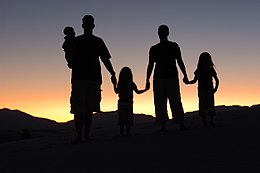 A family of parents and three children