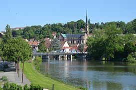 The Saint-Maimbœuf church and the Allaine river.