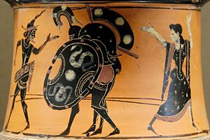 Ajax nese mrtvého Achilla, chráněného Hermem (vlevo) a Athénou (vpravo). Strana 1 z attické černofigurové nákrční amfory, ~520-510 př. n. l. Louvre, Paříž  