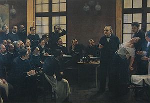 Jeanas-Martinas Charcot iš Salpêtrière ligoninės Paryžiuje demonstruoja hipnozę pacientui, kuriam padeda jo padėjėjas.
