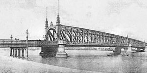 Willemsbrug kort efter åbningen i 1878, set fra Noordereiland. En ny bro blev færdiggjort i nærheden i 1981, og denne bro blev revet ned.  