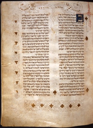Genesis, chapter 1 in the Biblia de Cervera (c. 1300, Biblioteca Nacional de Portugal). The Hebrew initial Bet is highlighted, the margins are decorated with scripture painting