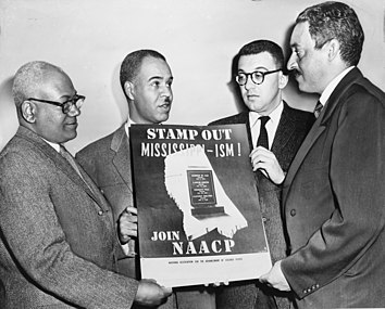 Members of the NAACP, including Thurgood Marshall (right), won Brown