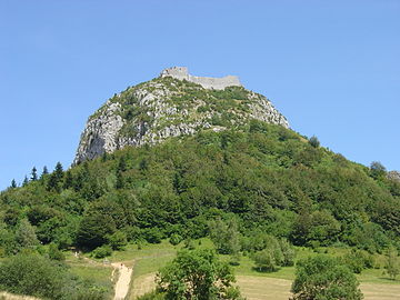 Some castles like Château de Montségur (France) were built very high up. This made them very visible and difficult to attack.