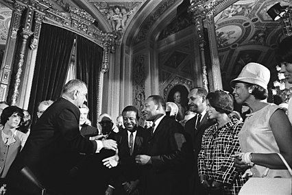 President Johnson, Dr. King, and Rosa Parks at the signing of the Voting Rights Act