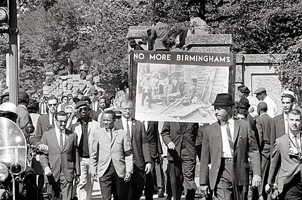 Activists march in Washington, D.C., in memory of the four girls killed in the bombing