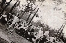 One of the Sonderkommando photos, showing naked women being sent to the gas chamber