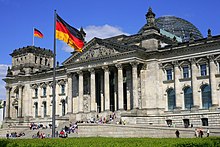 The restored Reichstag Building in Berlin, housing the German parliament. The dome is part of Foster's redesign.