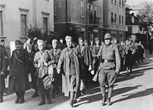 Italian soldiers guarded and disarmed by German soldiers in Bolzano, September 1943