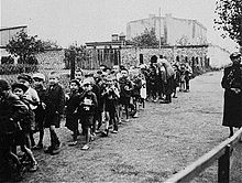 Jewish children being deported to a death camp, where they will be killed (1942)