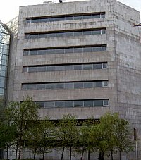 Et af de civile kontorer (med tilnavnet "Bunkers").   Dublin Corporation byggede dem kontroversielt nok på et af verdens bedst bevarede vikingeområder ved Wood Quay. Robinson gav juridisk støtte til lederne af den mislykkede kampagne for at redde stedet.  