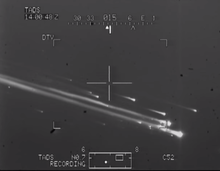 Columbia se dezintegrează în atmosferă. Văzută de la un elicopter olandez care operează în apropiere de Fort Hood, Texas.  