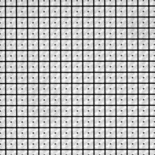 Enlarged section (approximately 0.2 mm by 0.2 mm) of a DLP chip with approximately 13 µm by 13 µm square micromirrors in fourteen rows and columns each