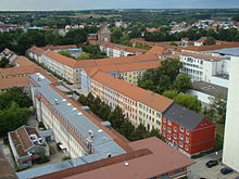 Typical reconstruction block edge of the 1950s with low building density to the courtyard side