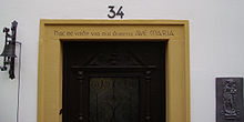 Latin inscription above the entrance to the rectory of Tiefenpölz: "Do not enter without saying a Hail Mary!"