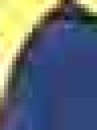 When magnified, the compressed 8×8 squares can be seen.