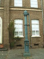 Historic water pump in Kaster