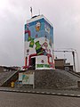 Lighthouse covered in graffiti