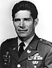 A black and white image showing the head and shoulders of Rocco in his military dress uniform with ribbons.