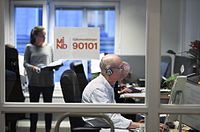 En operatør for Sveriges Mind Självmordslinjen (hotline til forebyggelse af selvmord) på arbejde.  