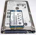 An mSATA SSD on top of a 2.5-inch SATA drive